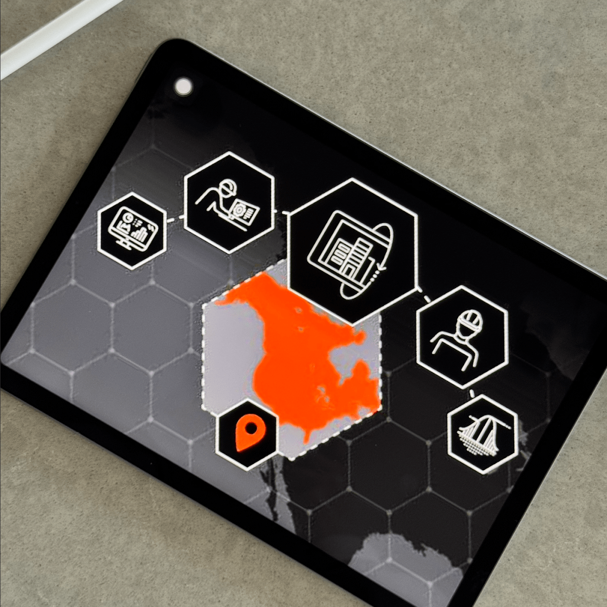 Grid 26 Reliability-min An iPad outlining the GRID26 Construction process on it.